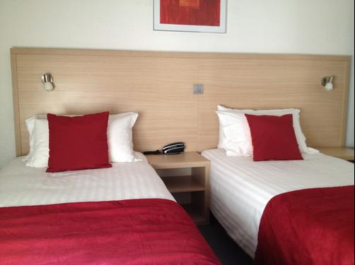 Hotel Teranga - Juan-les-Pins - Schlafzimmer