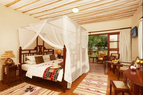 Neptune Palm Beach Boutique Resort & Spa All Inclusive - Ukunda - Schlafzimmer