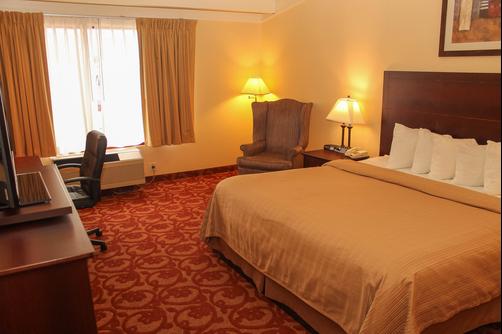 Quality Inn Airport - Buffalo - Schlafzimmer