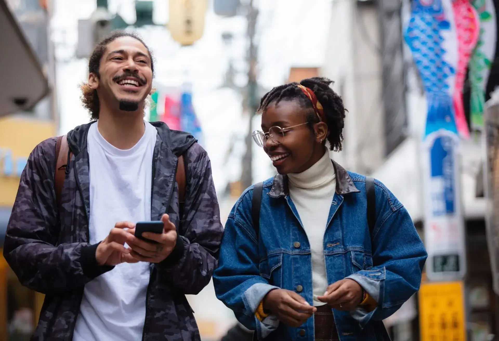 Two friends chatting on the street