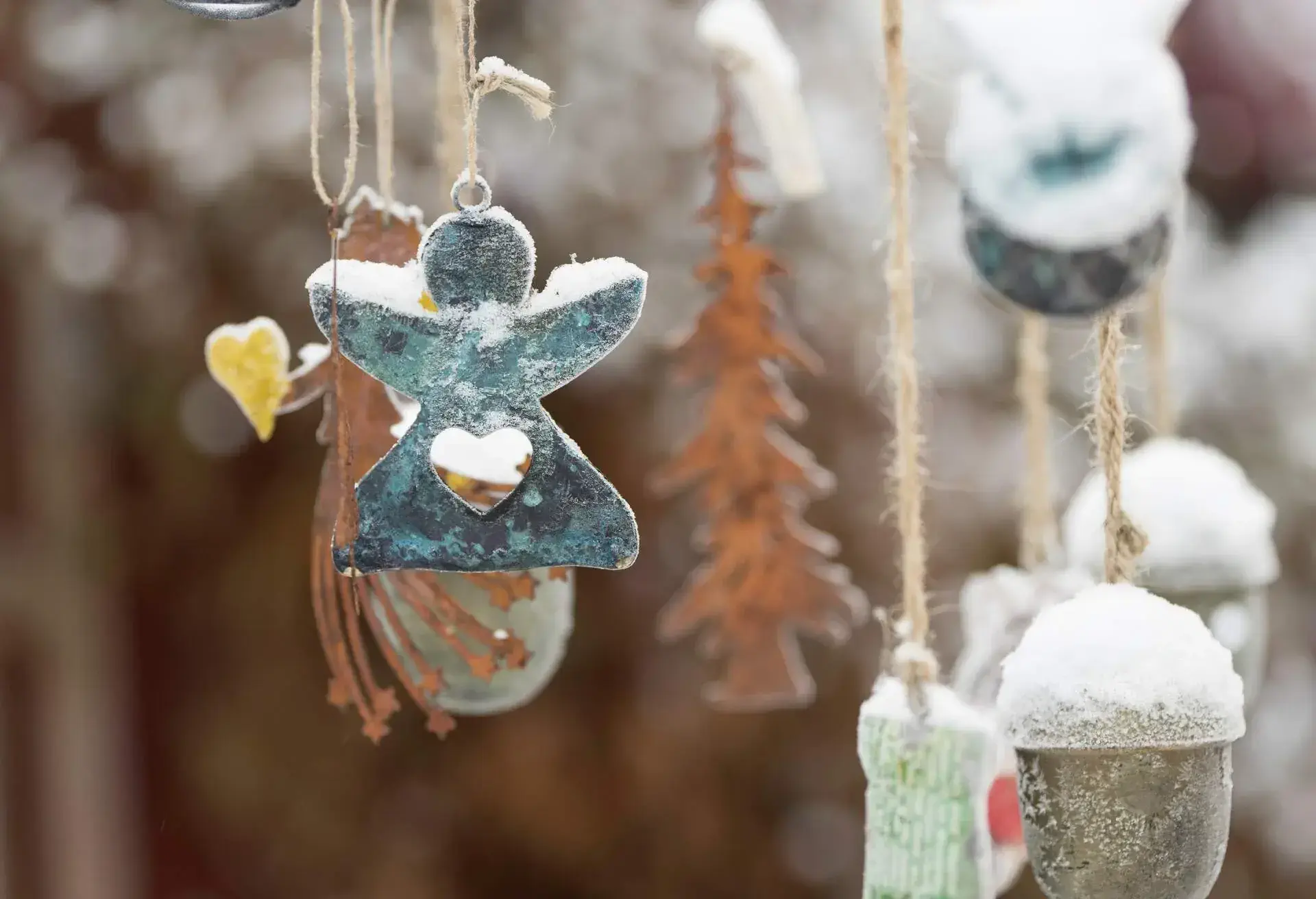 Christmas decorations covered in snow