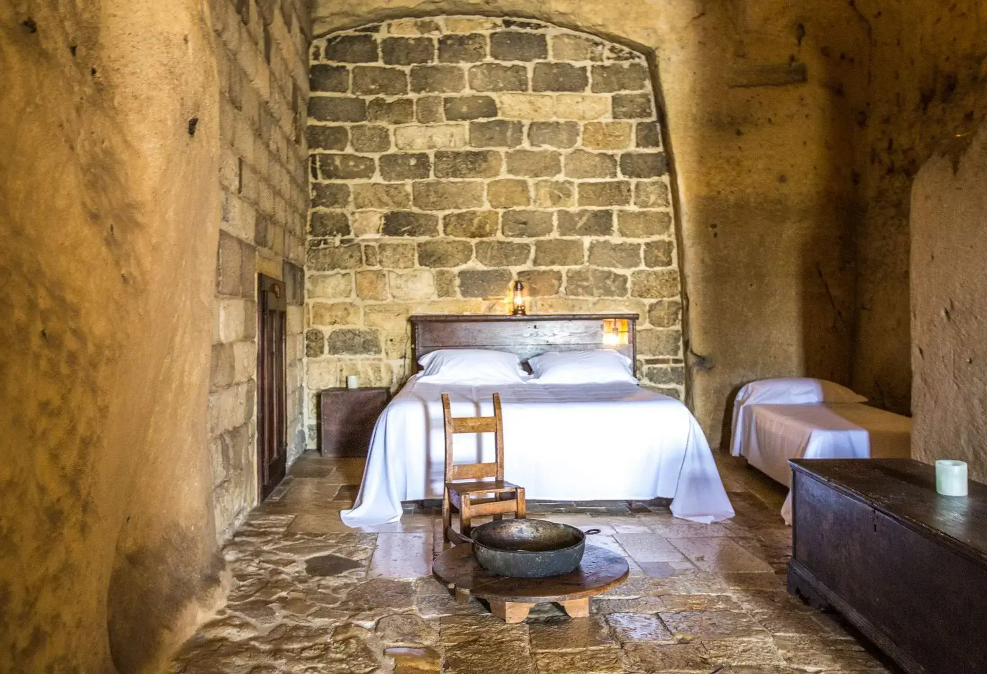 A photo of a bedroom at a Matera hotel in Italy.