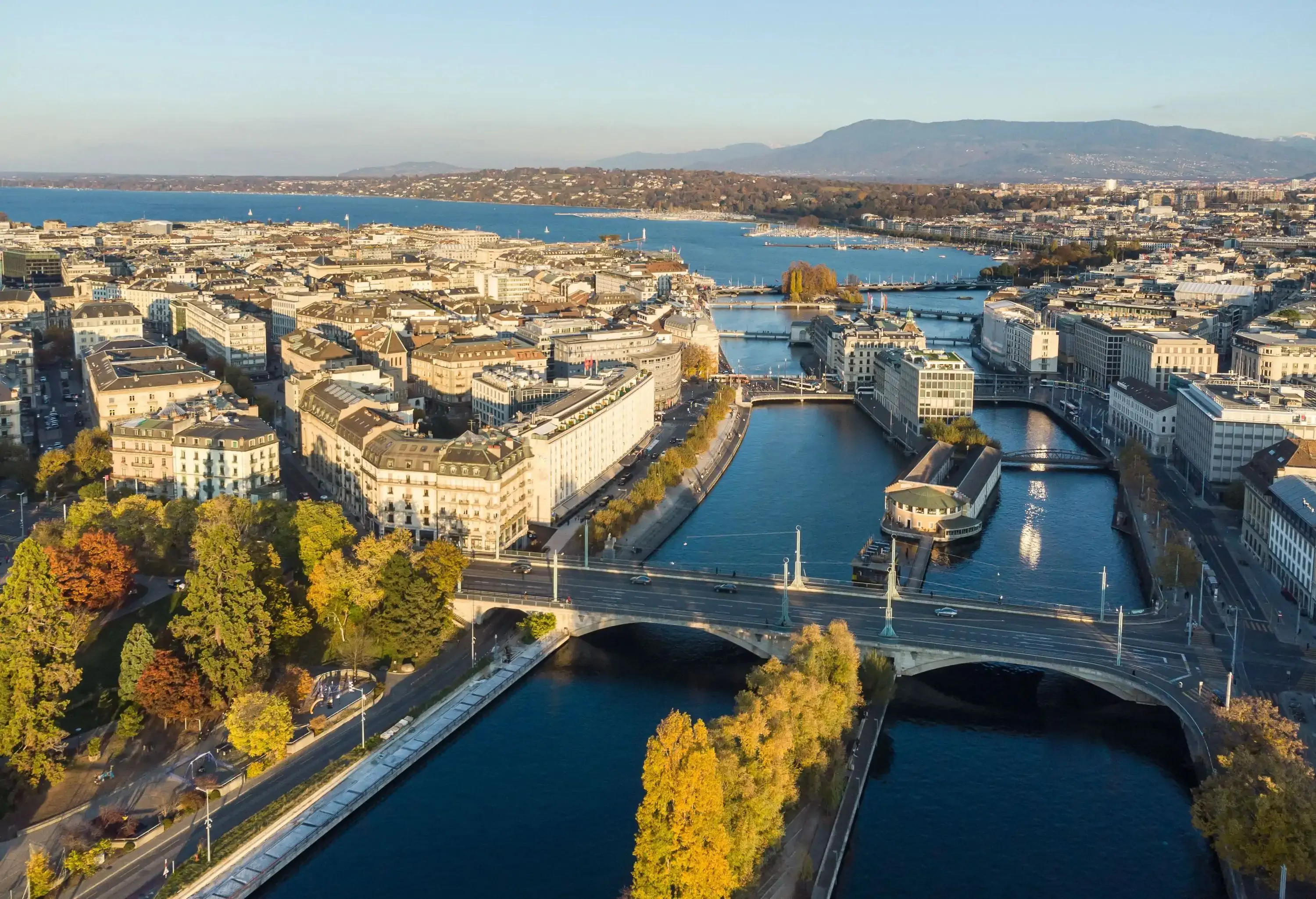 Aerial view of the Rhone river that flow in the heart of Geneva banking and business district from the Lake Geneva in Switzerland second largest city