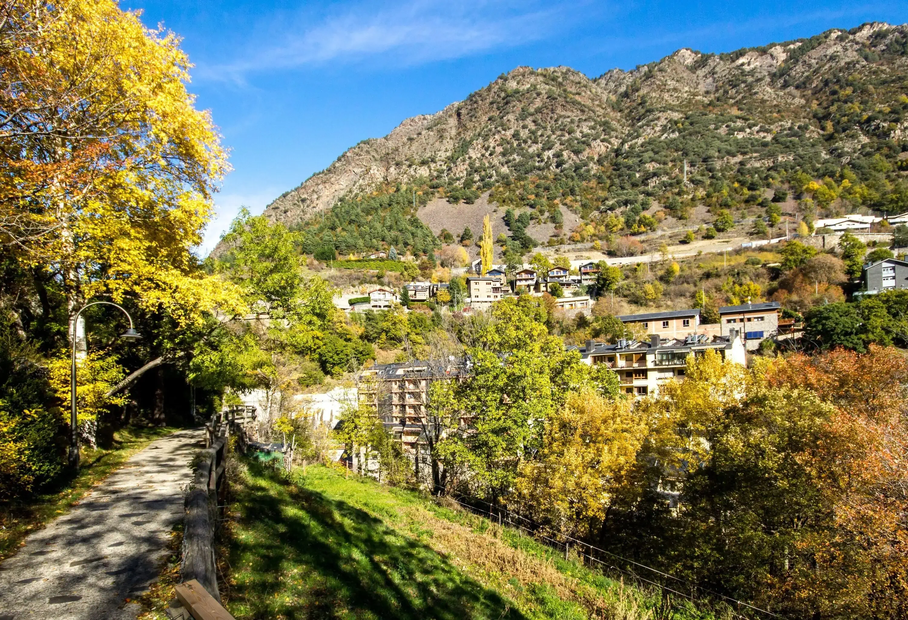 Path and houses on the slopes of the Pyrenees mountains