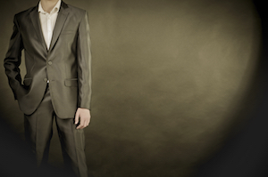 man in suit on a black background