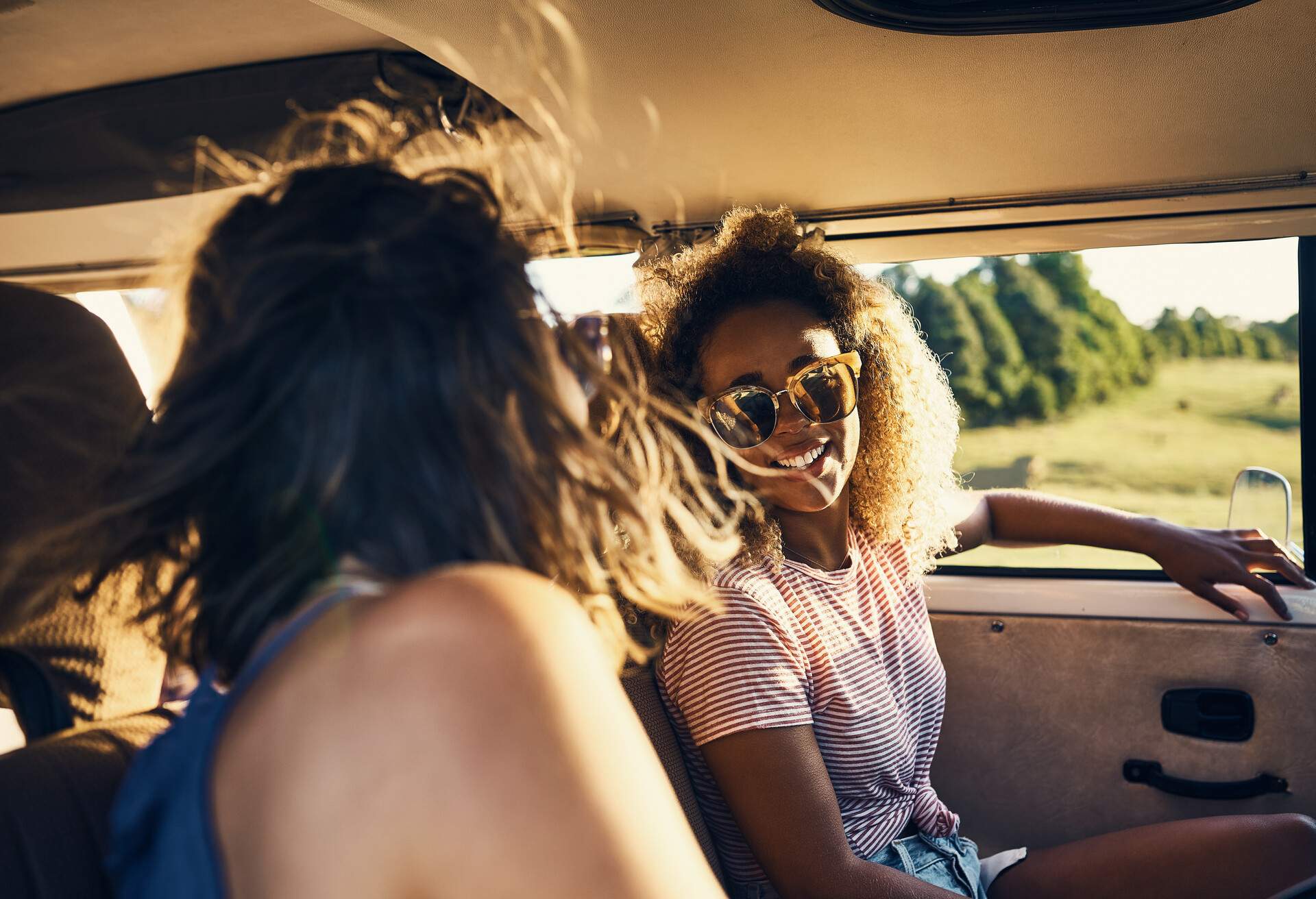 Two young women going on a road trip.
