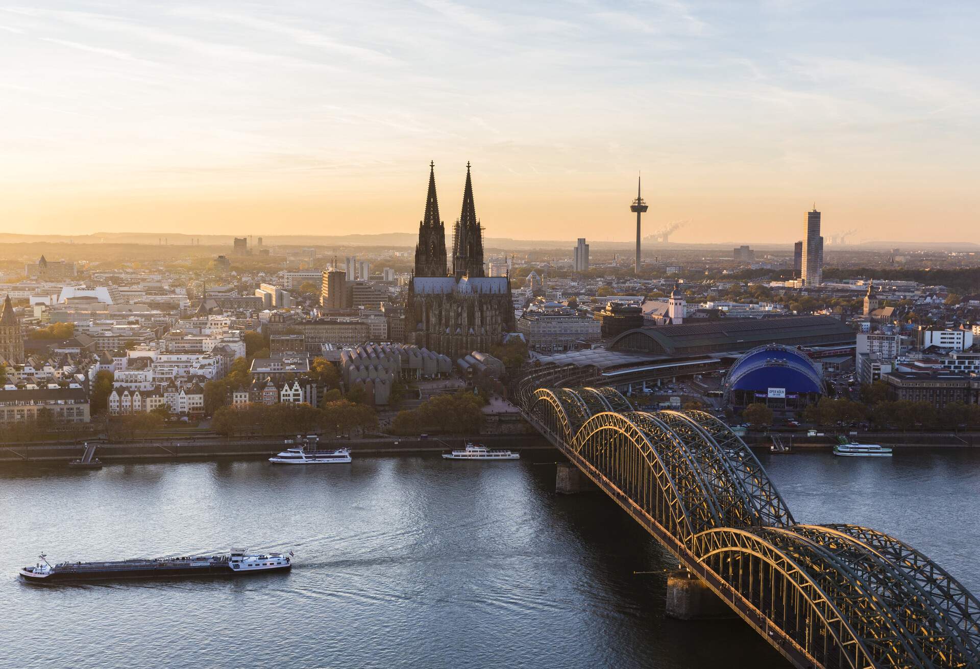 Elevated View of Hohenzollern Railroad Bridge over River Rhine by Cologne Cathedral at Sunset, North Rhine-Westphalia, Germany.