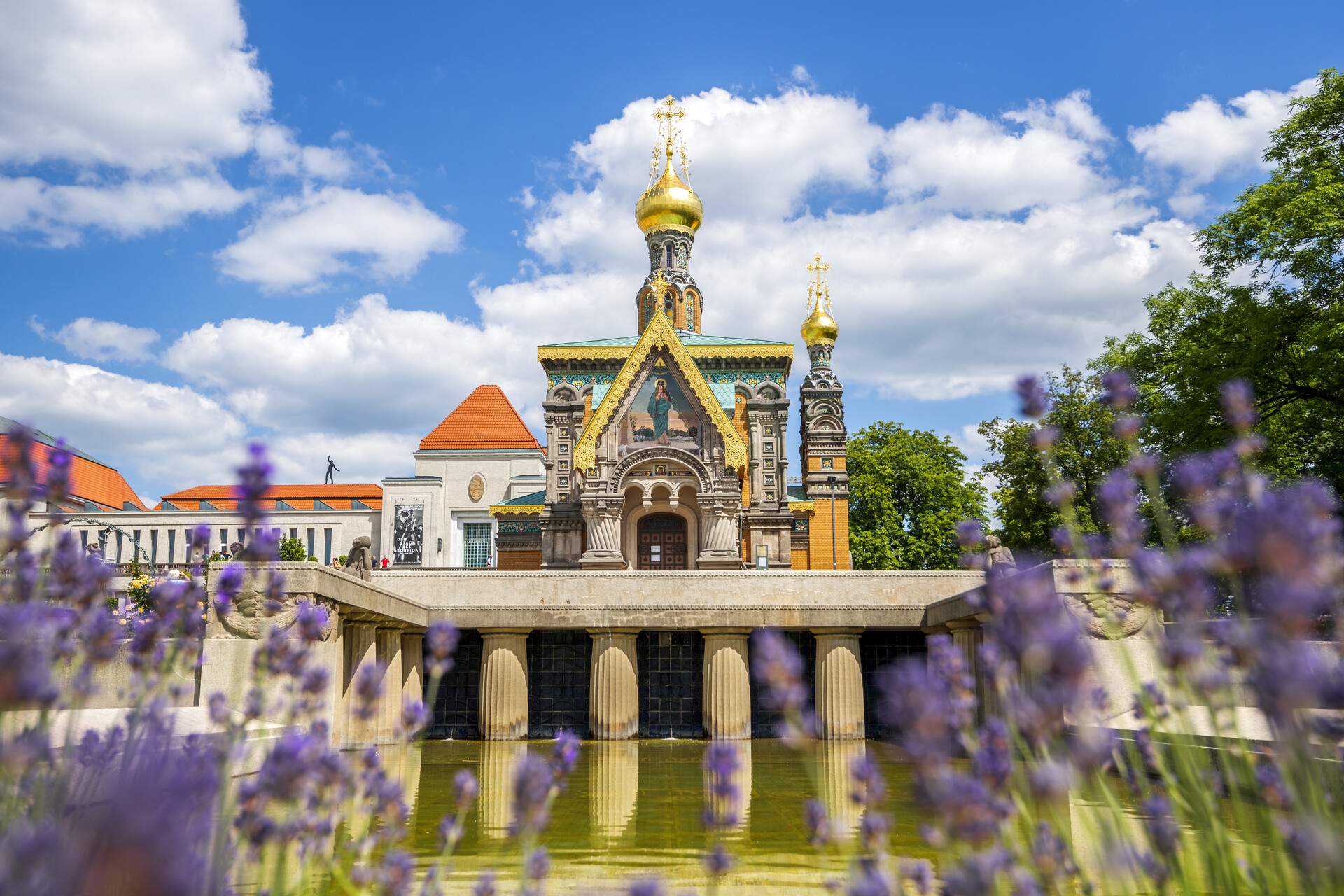 A russian chapel in Darmstadt shot between lavender flowers on a sunny day