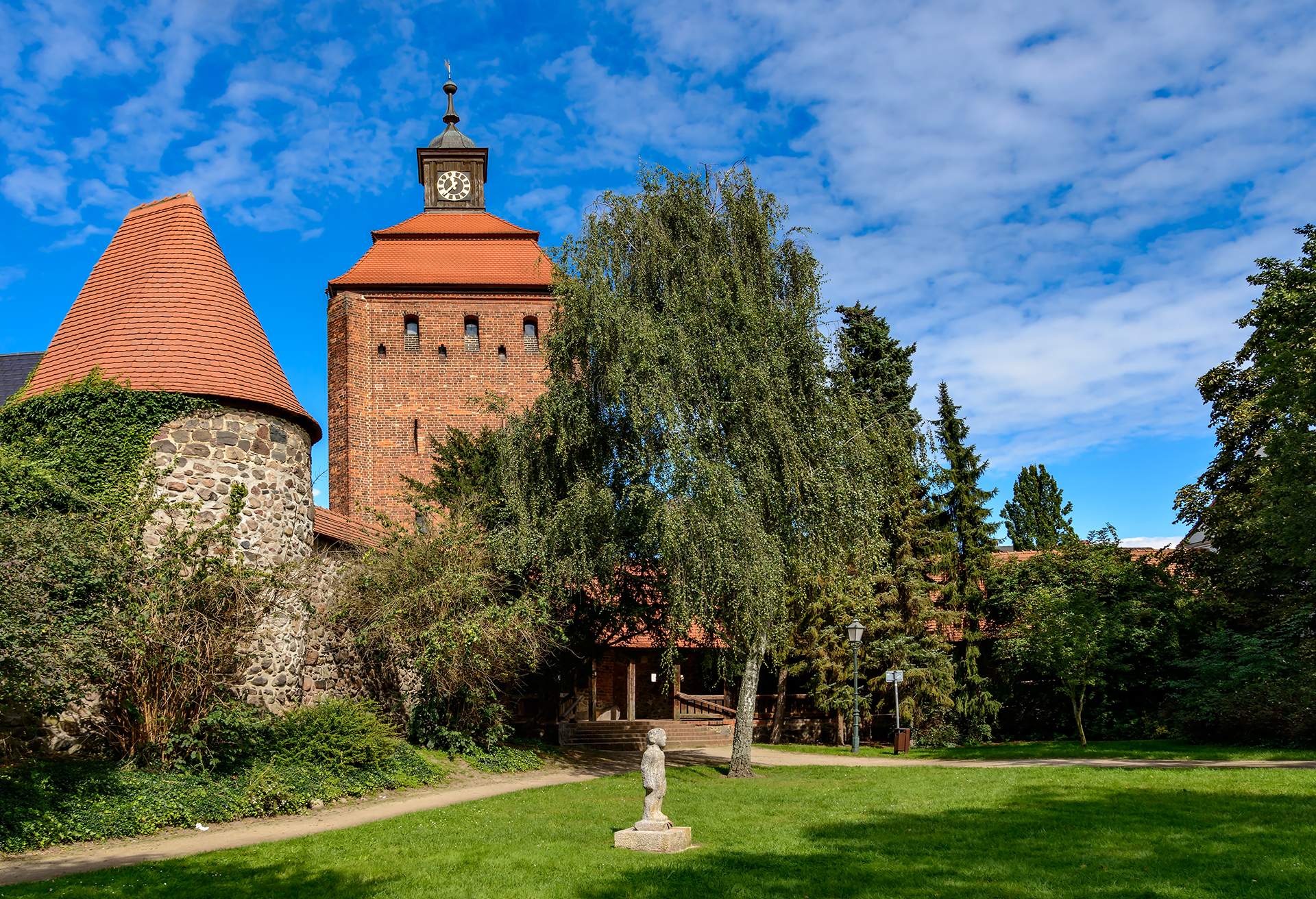 Street view of park and adjacent church in bernau, brandenburg, germany