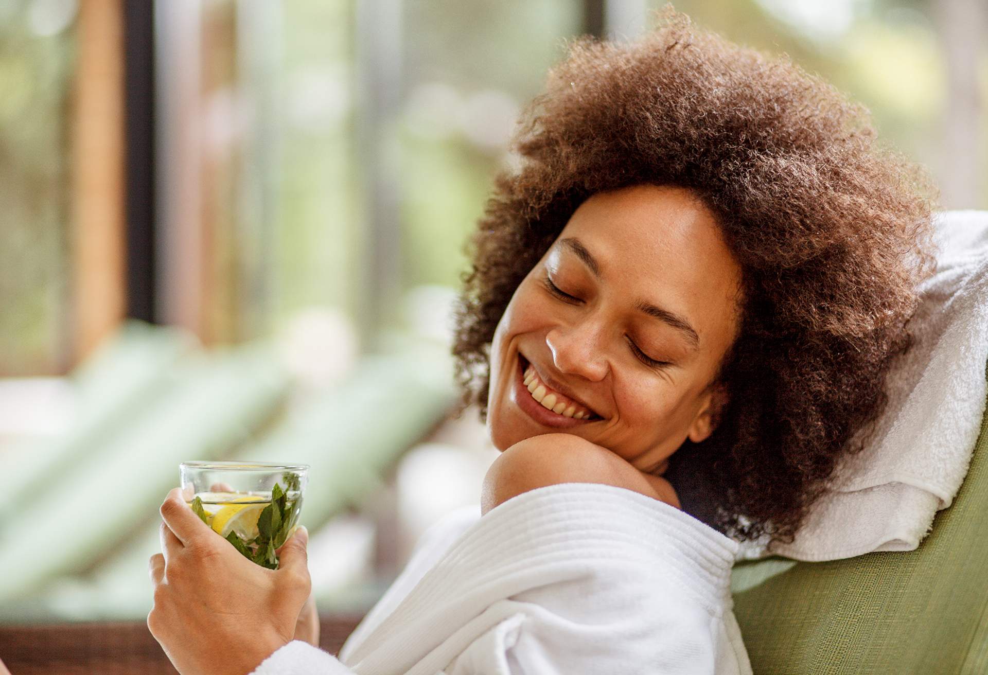 wellness_spa_person_woman-drinking-tea_gettyimages-1160297031-copy