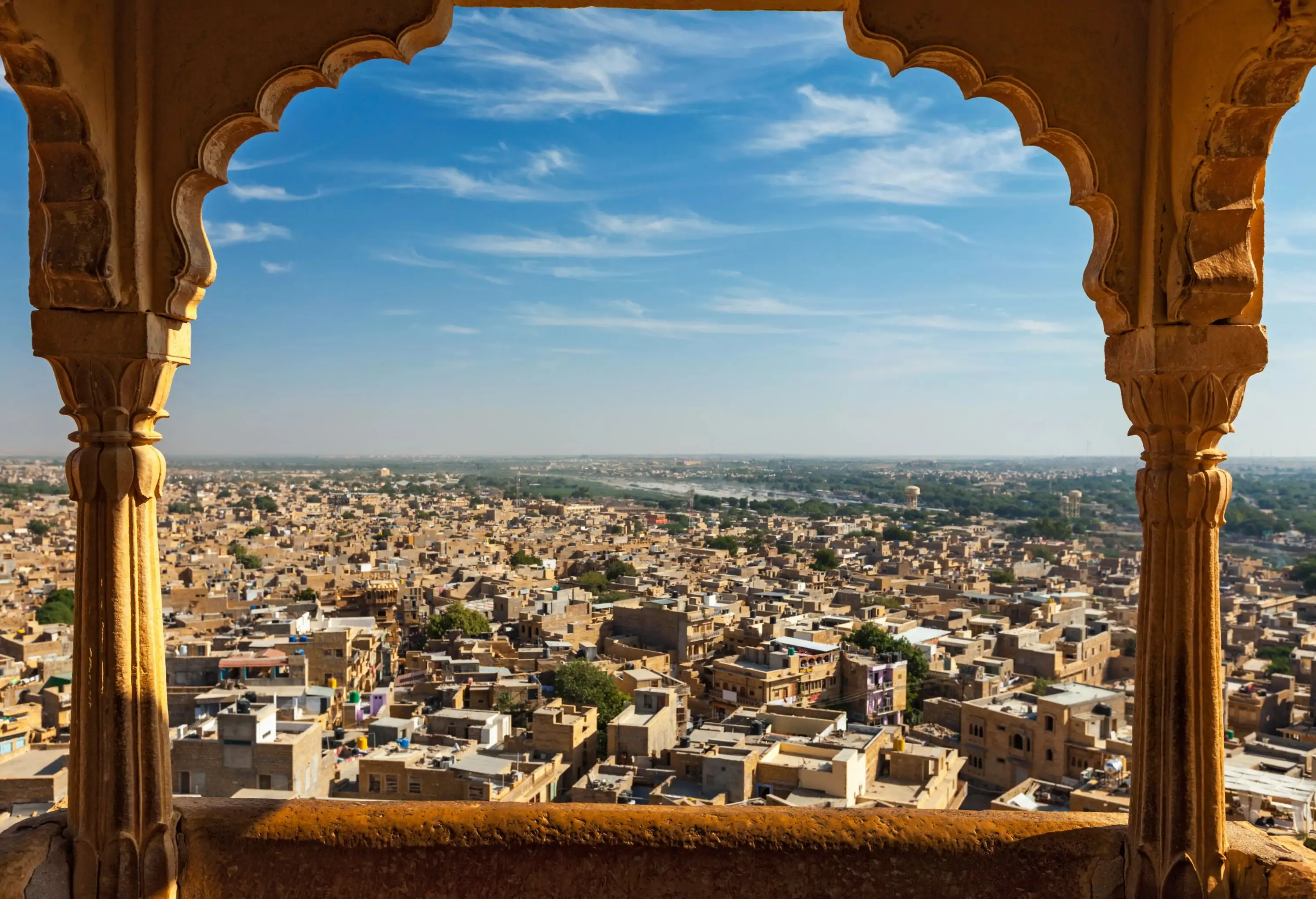 From the vantage point of a rooftop, the cityscape reveals a panorama of buildings with flat roofs stretching into the horizon.