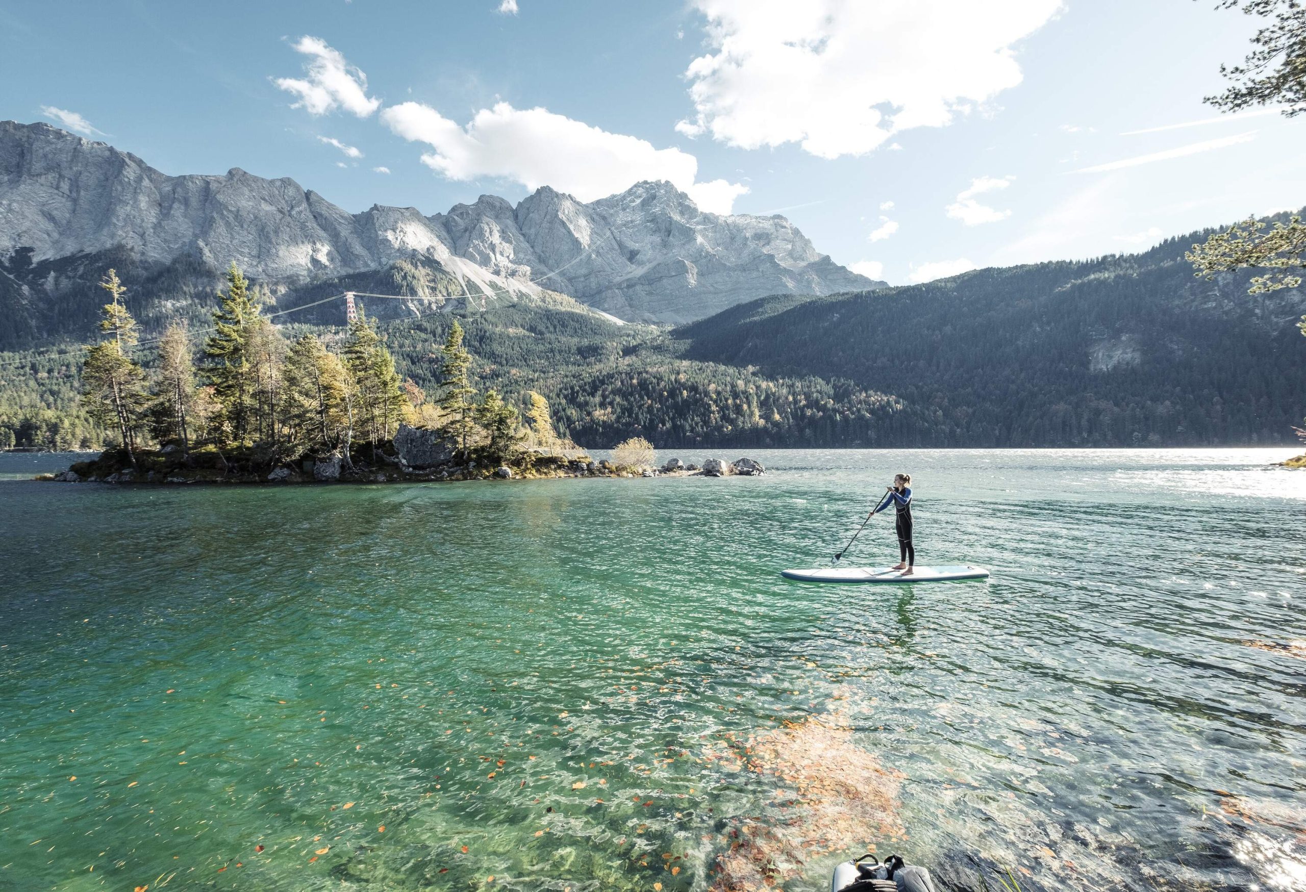 dest_germany_bavaria_garmisch_eibsee-lake_theme_sup_paddleboarding_gettyimages-1308858280_universal_within-usage-period_85127