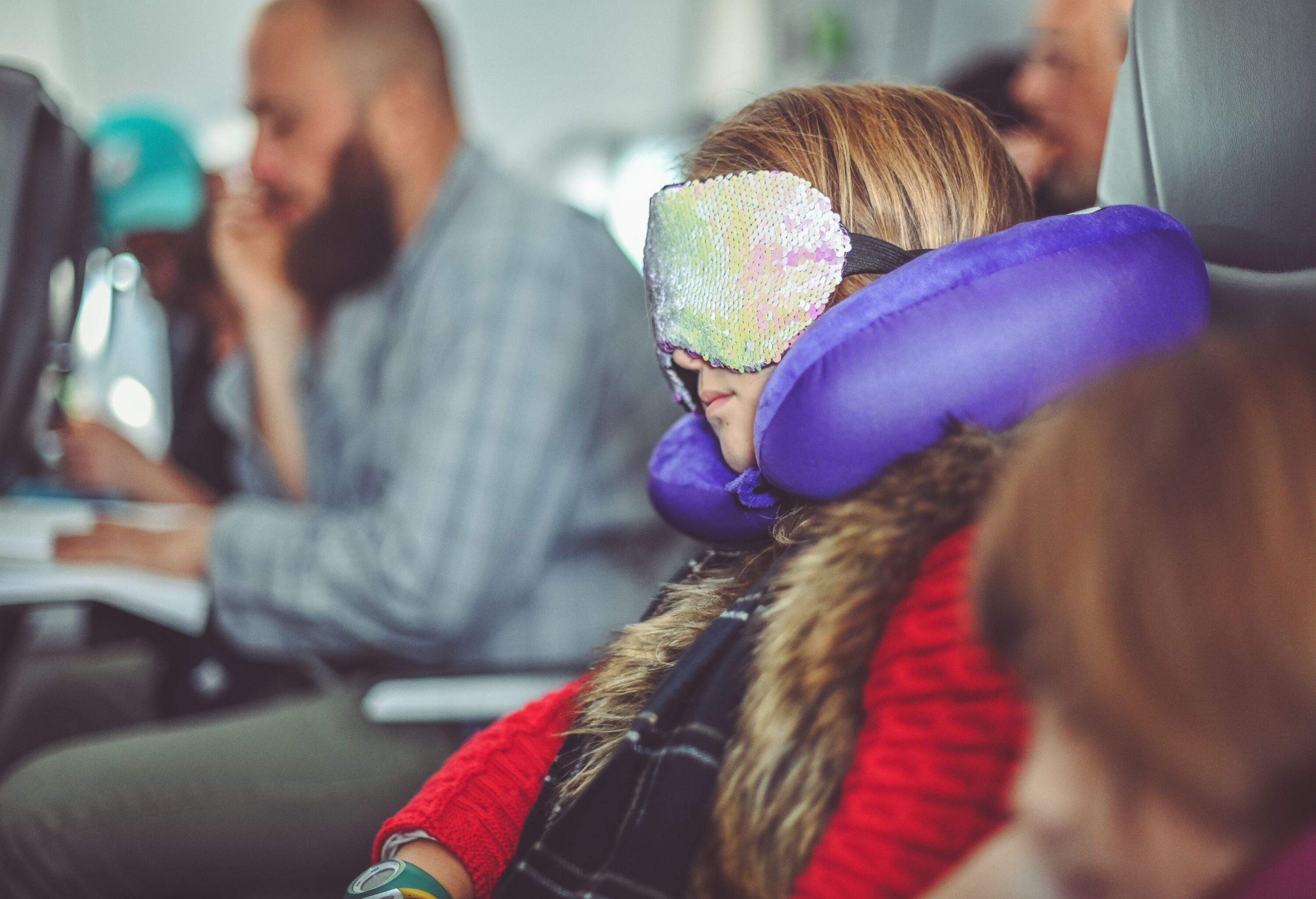 Girl falls asleep on an airplane