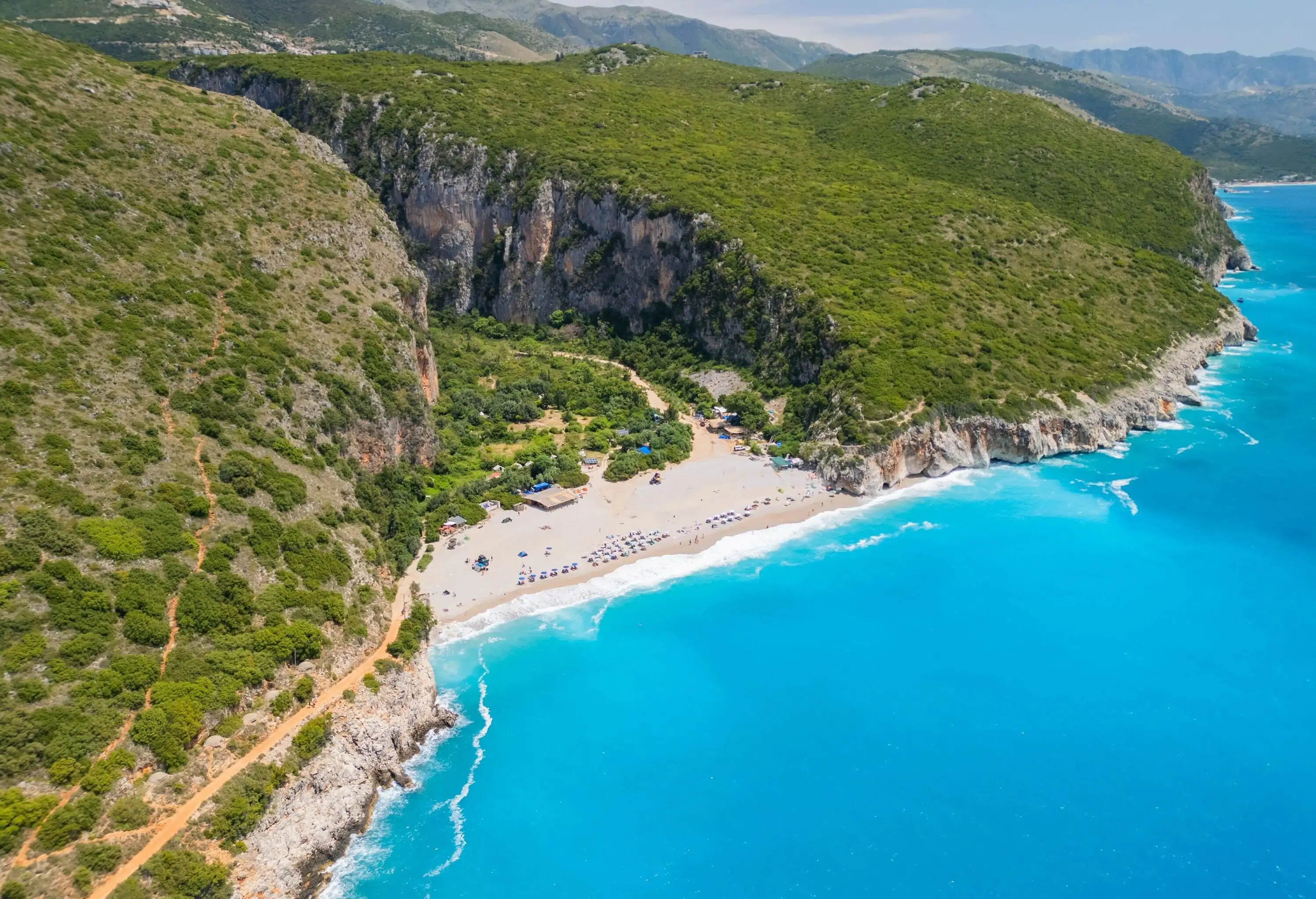 Aerial view of a wild beach and canyon