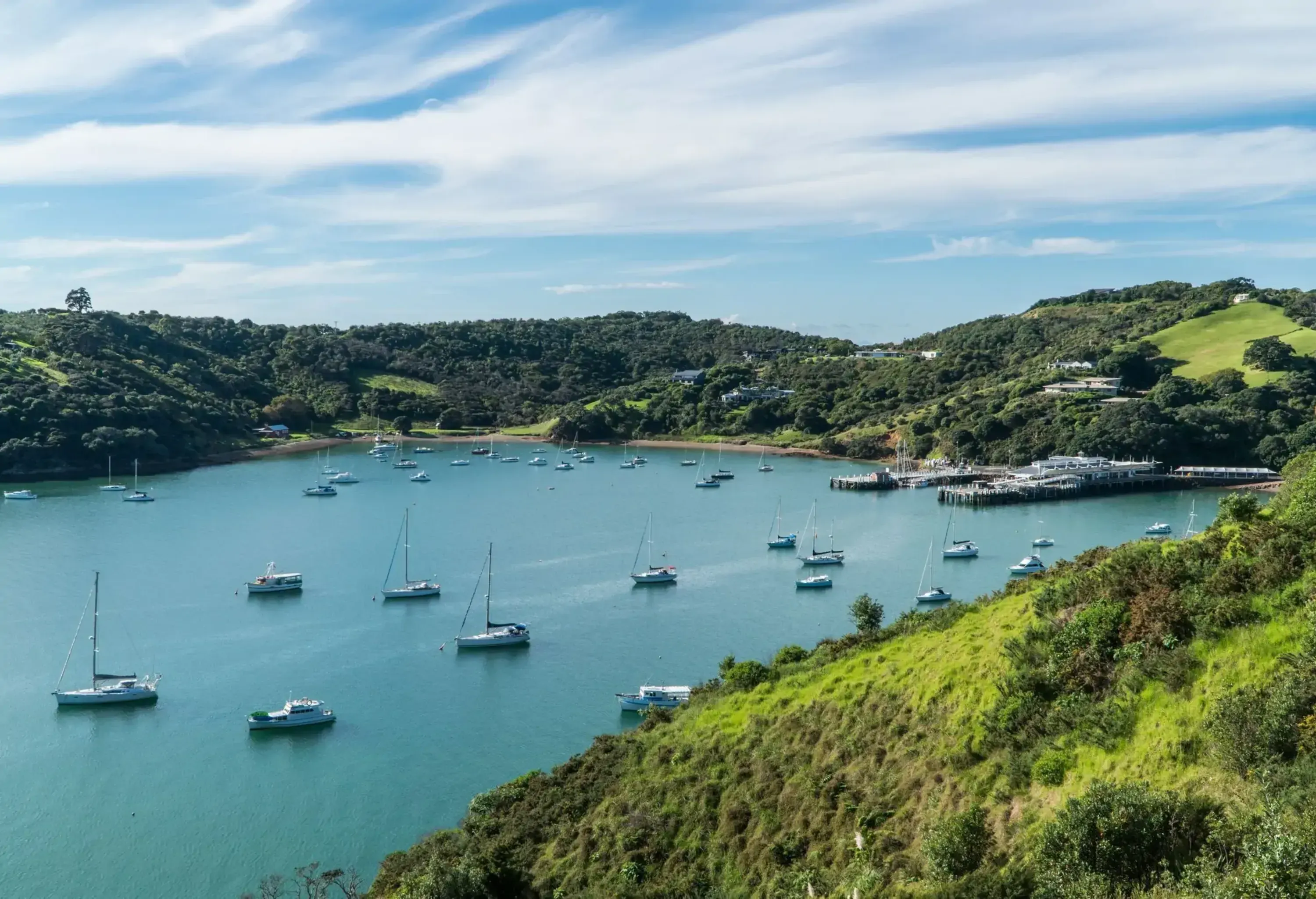 Bay with small sailing boats on Waiheke island, New Zealand
