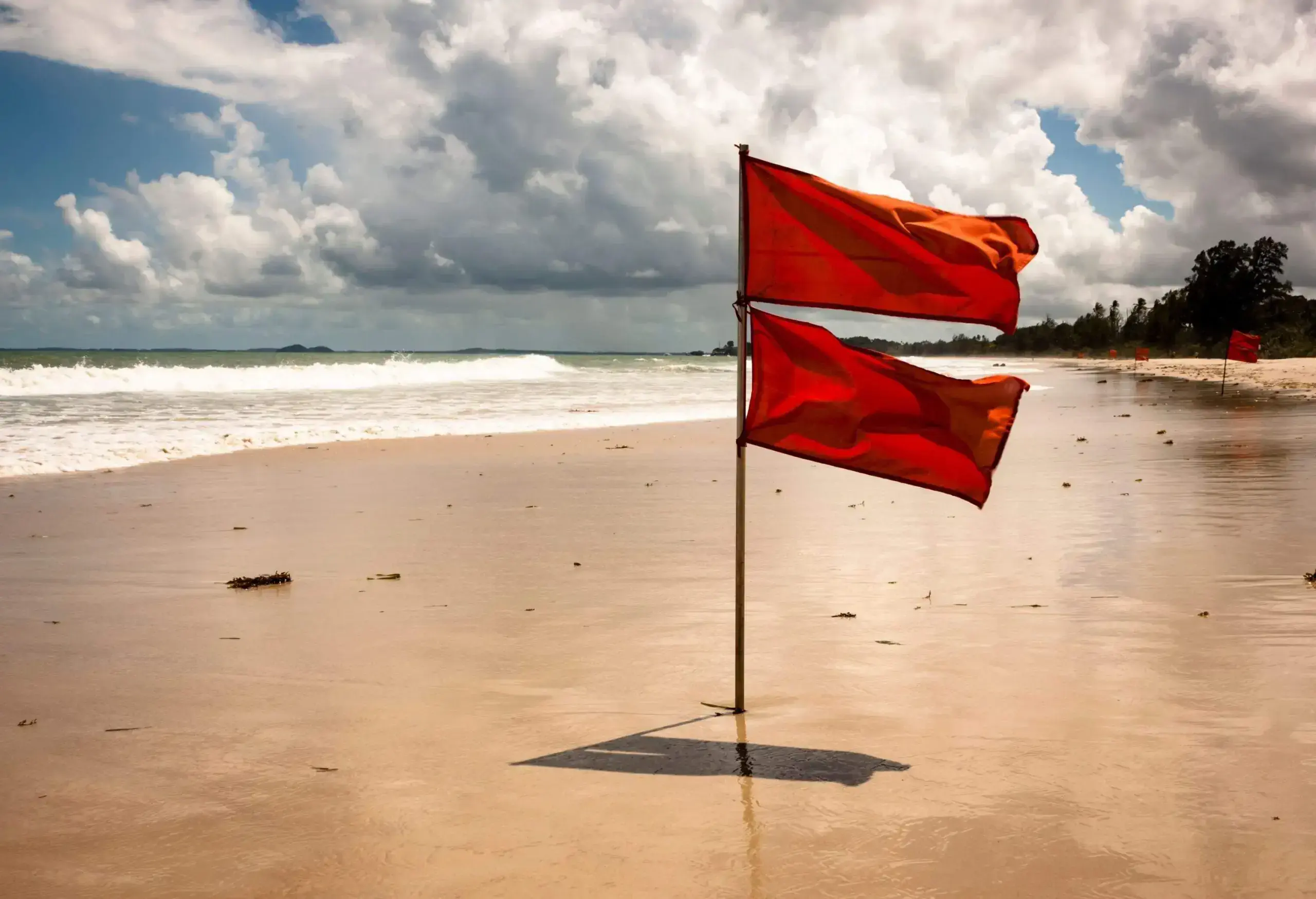 No swimming as there are red flags on the beach in Bintan, Indonesia