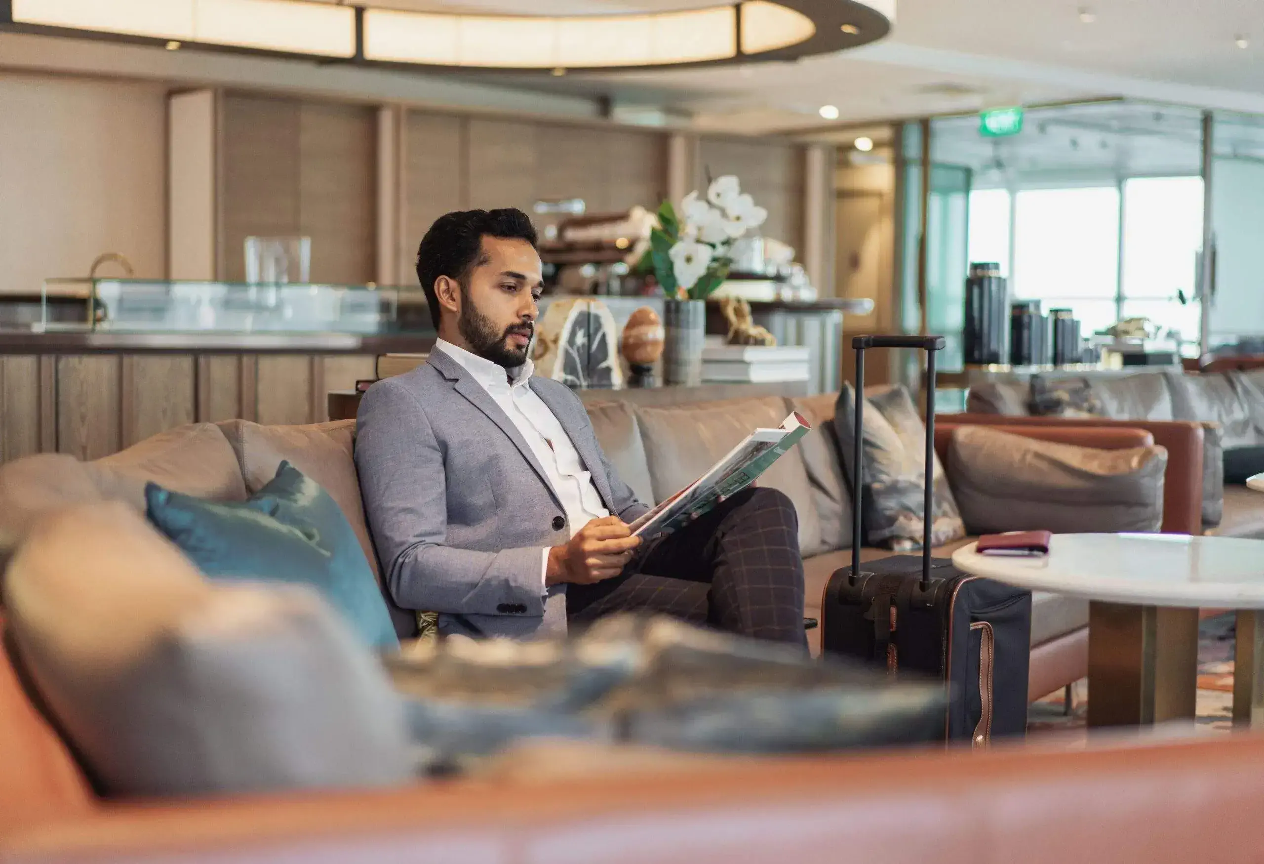 A men relaxing in airport lounge
