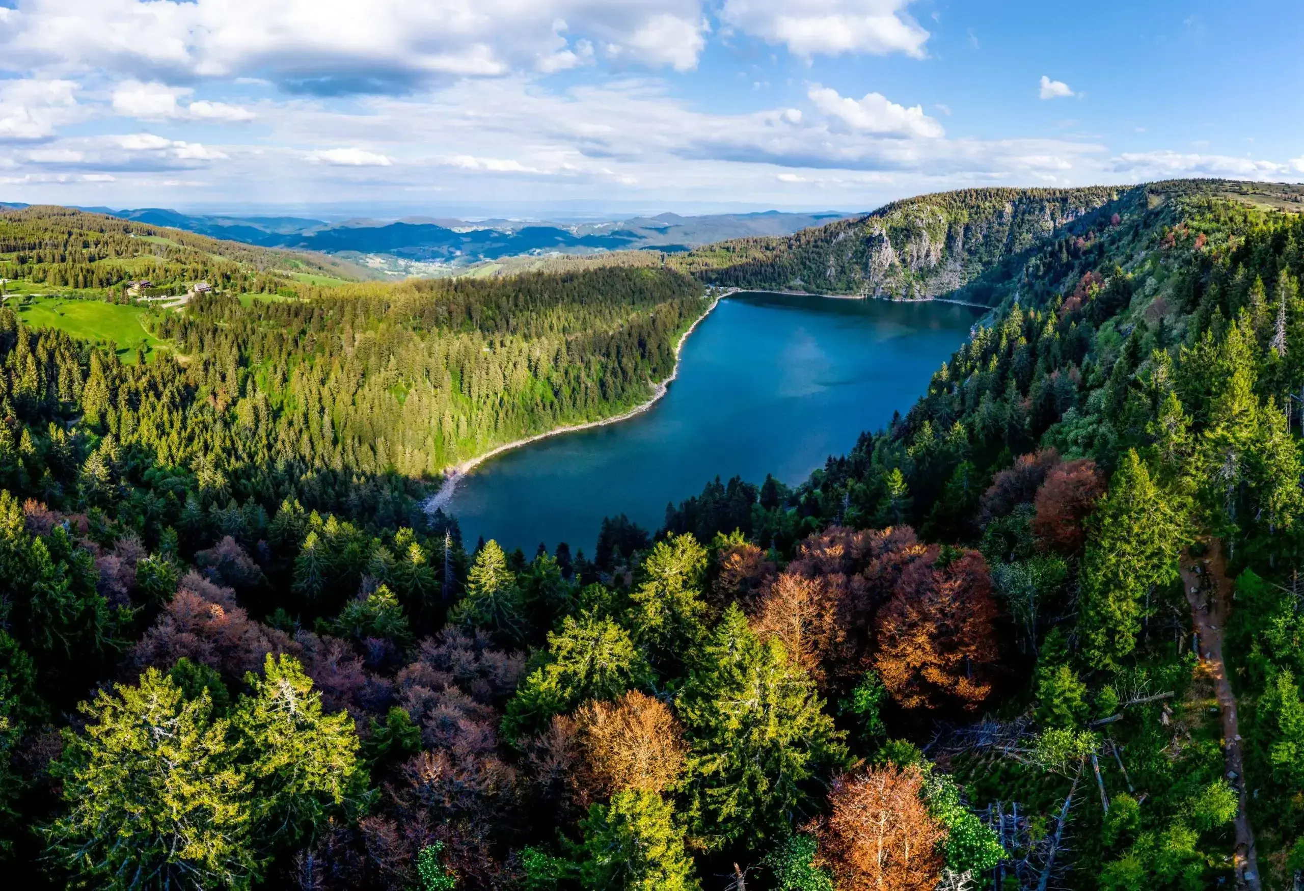 Panoramic landscape. View from the drone of the White Lake in the Vosges, Alsace. Beautiful cliffs, gorgeous nature of the national park. France.