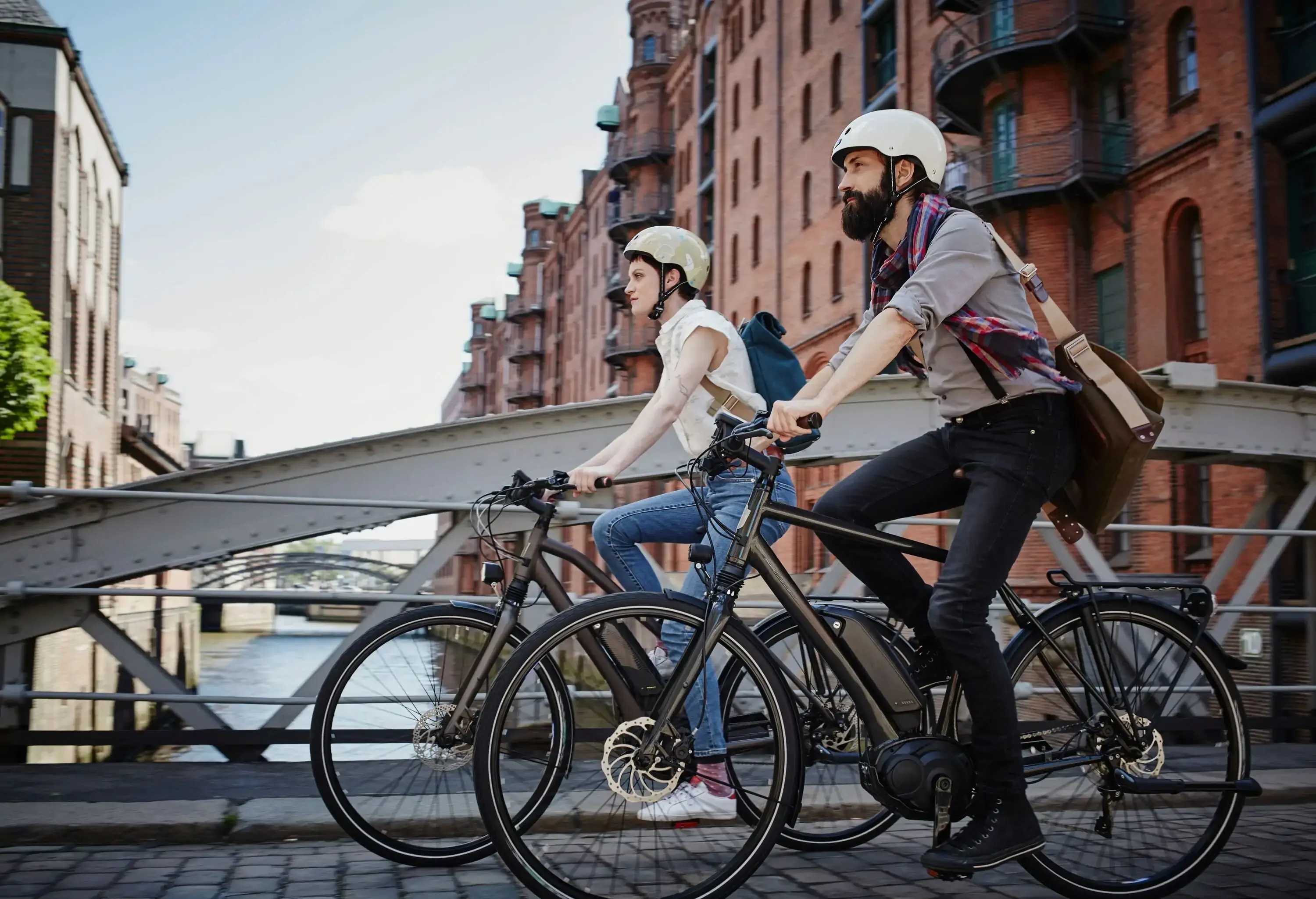 couple riding electric bicycles at Old Warehouse District