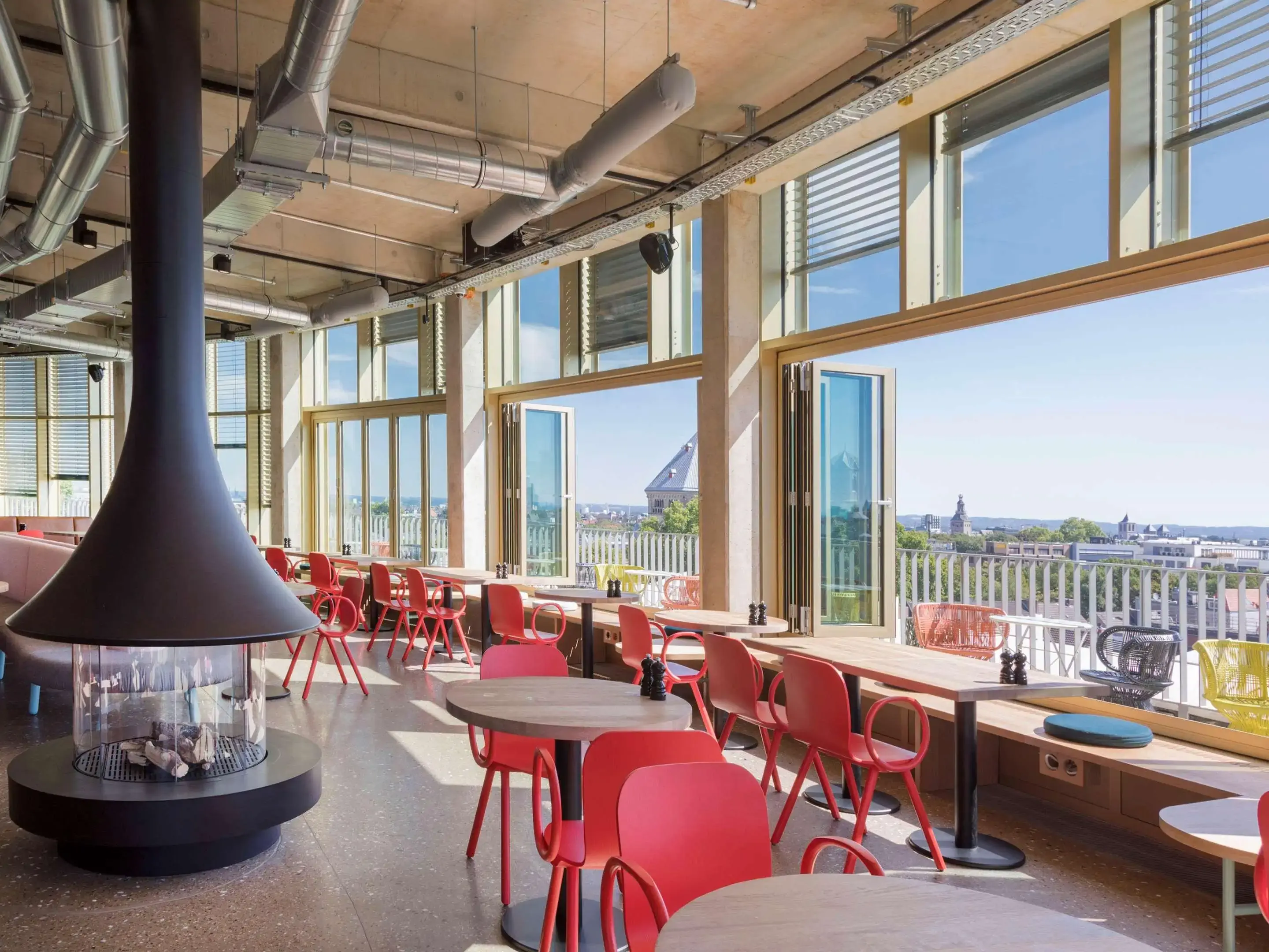 Restaurant of a hotel overlooking a city from a high angle